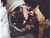 130 - Handshake as Apollo and Soyuz crafts dock together